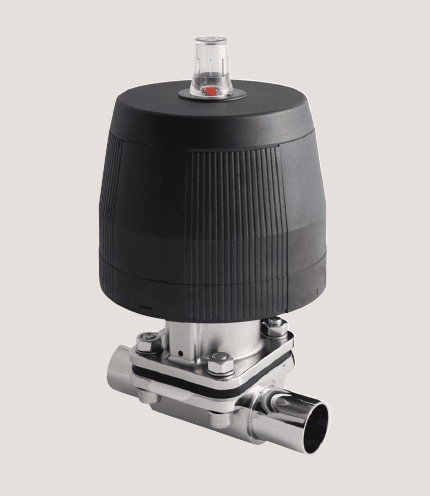 A black industrial valve with a transparent indicator on top and metal pipe connection.